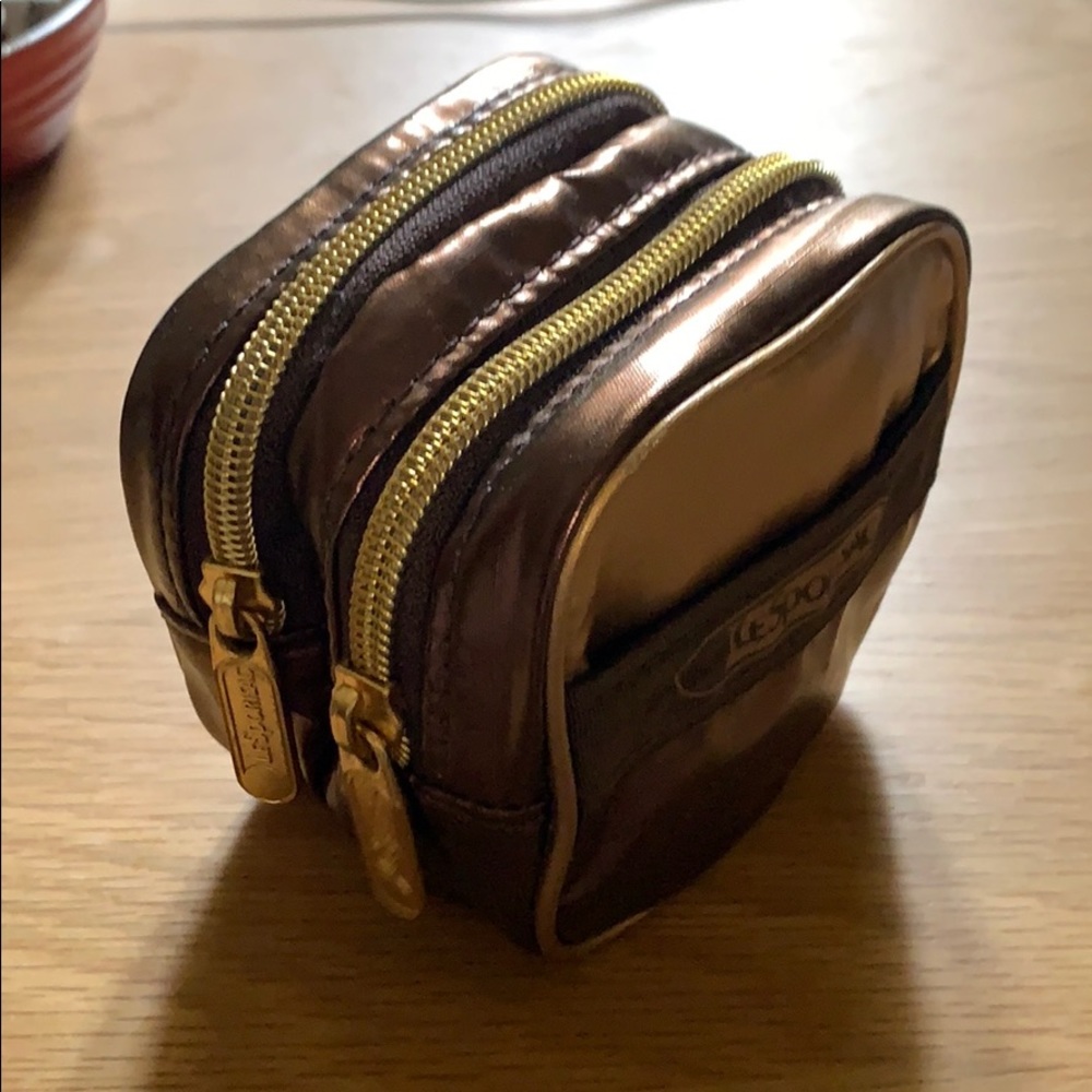 Free w/ bundle. Lesportsac Utility Pouch Gold